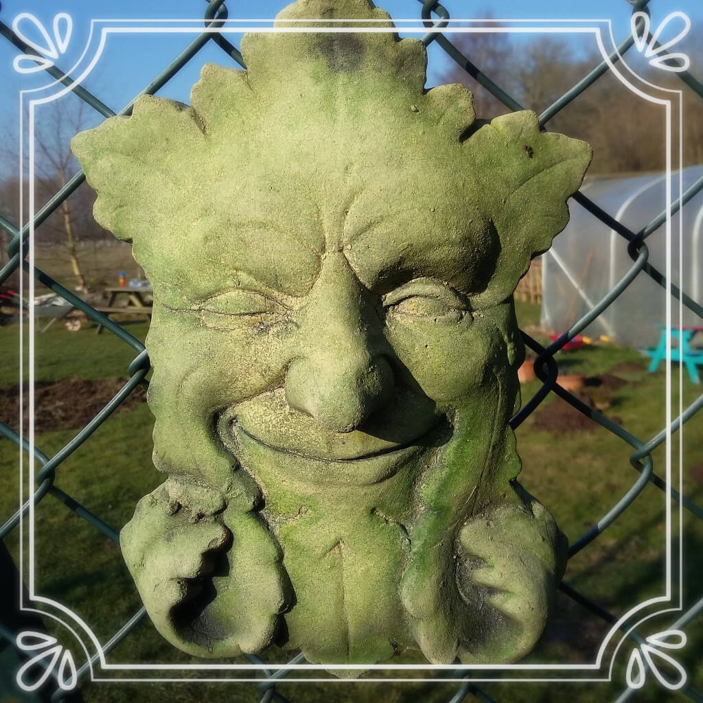 winking green man